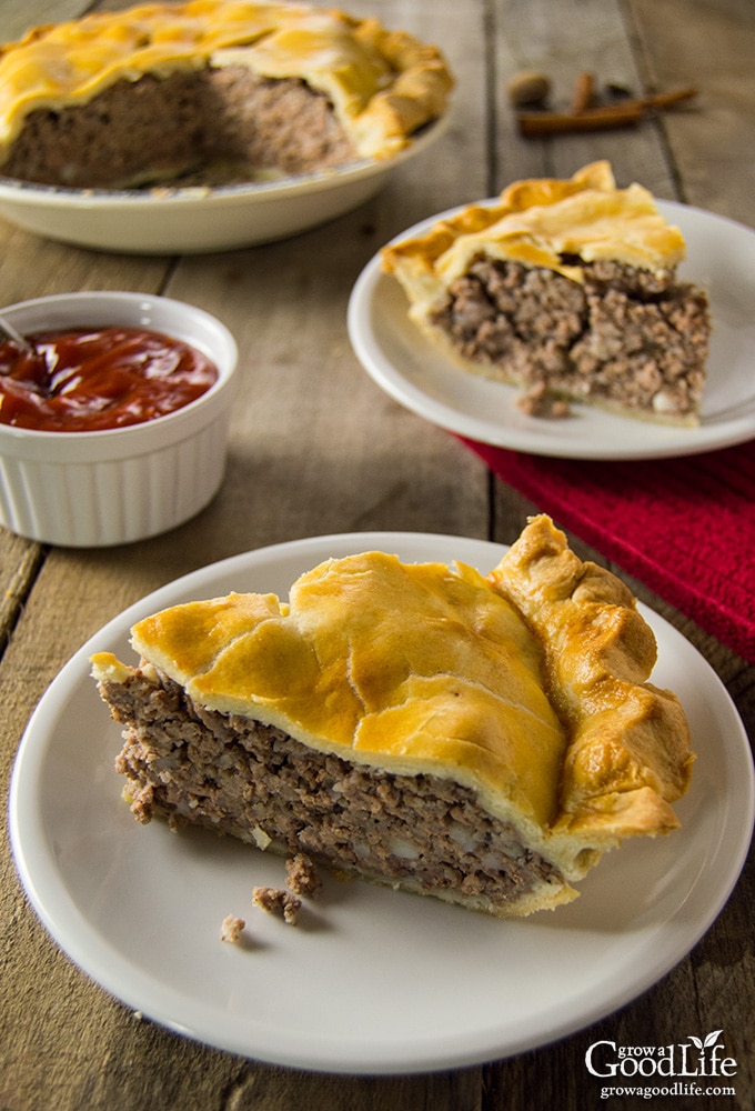 Tourtière, also known as pork pie or meat pie, is a traditional French-Canadian pie served by generations of French-Canadian families throughout Canada and New England. It is made from a combination of ground meat, onions, spices, and herbs baked in a traditional piecrust. Tourtière: A French-Canadian Meat Pie Recipe via Grow a Good Life || Christmas Eve Dinner: 5 Fun Festive Holiday Feasts! || Letters from Santa Holiday Blog