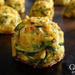 This tasty recipe combines shredded zucchini with garlic, Parmesan cheese, fresh herbs, and is served with a marinara dipping sauce for an Italian inspired twist.
