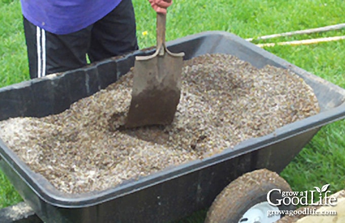 image of mixing soil in a garden cart