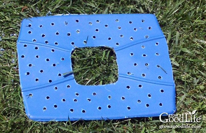 Drilling evenly spaced holes in the aeration shelf for airflow and moisture movement.