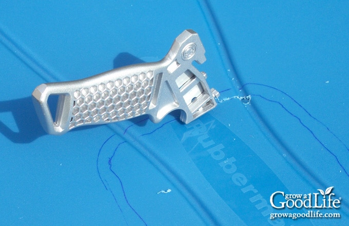 Tracing and cutting an opening in the aeration shelf for the wicking basket.