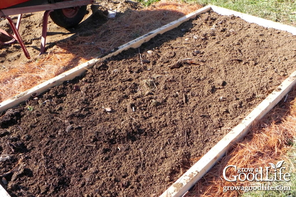 Freshly cleaned and amended garden bed.