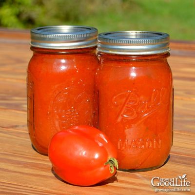 No store bought tomato sauce compares with the flavor of homemade. Capture summer in a jar with this seasoned tomato sauce recipe for home canning.