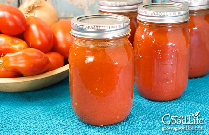 jars of tomato sauce on a table
