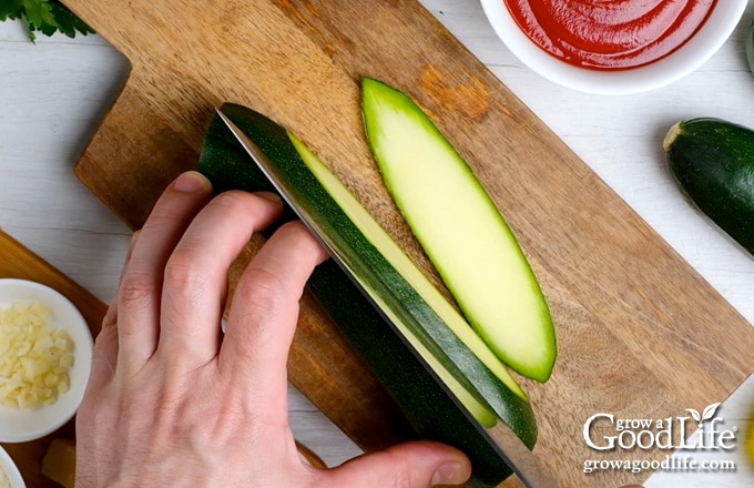 cutting zucchini into strips