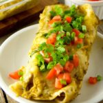 Chicken enchiladas with roasted green chile sauce is a delicious meal option when you’re craving Southwestern-style comfort food. The mellow spicy flavor of the Anaheim or New Mexico type peppers pairs well with shredded chicken and Mexican spices and cheese.