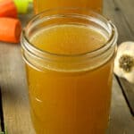 jars of turkey stock on a table