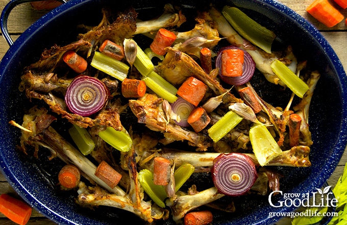 pan of roasted bones and vegetables