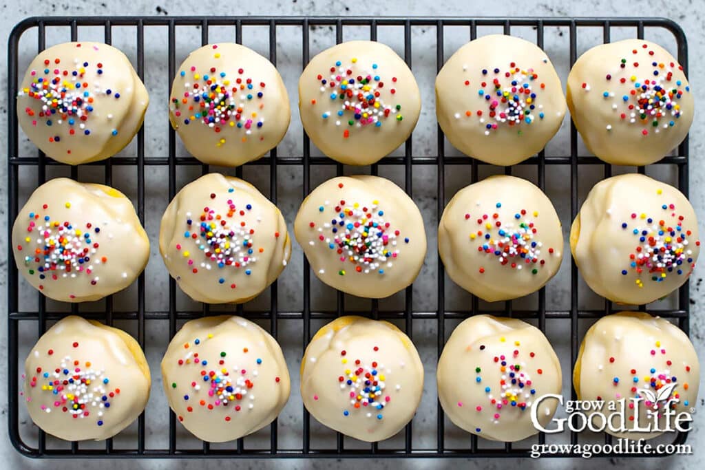 Decorated Italian anise cookies on a cooling rack.