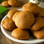 plate of molasses cookies on a table