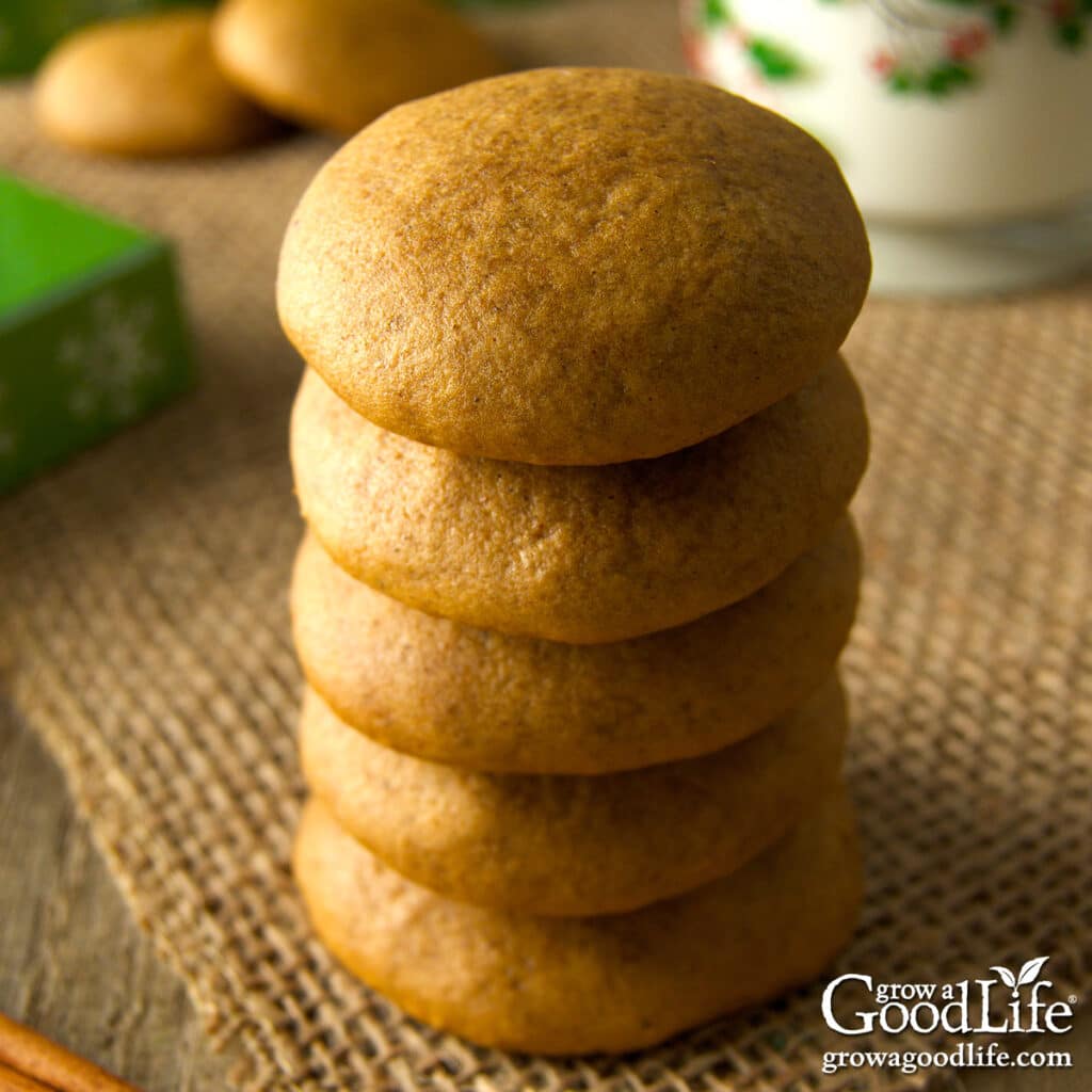 A stack of old fashioned, soft molasses cookies on a table.