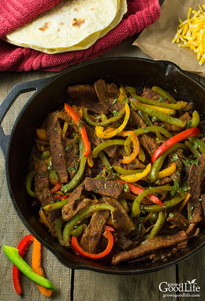 These sizzling beef steak fajitas are made with strips of steak infused with a flavorful chili-lime marinade, combined with colorful peppers, onions, and folded into a warm tortilla.