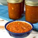 This tomato salsa canning recipe is packed with tomatoes, peppers, onions, and just enough spicy tingle to tickle your taste buds. Open a jar any time and enjoy with tortilla chips or with your favorite Mexican inspired meals.