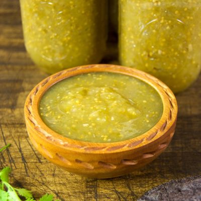 Canning roasted tomatillo salsa is a great way to preserve the abundance of tomatillos that the garden produces. Jars of tomatillo salsa verde come in handy for all your favorite Mexican dishes.