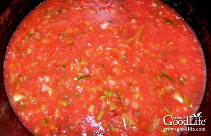 overhead photo of the salsa simmering on the stove