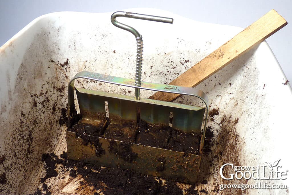 Soil blocker tool used to make soil blocks.