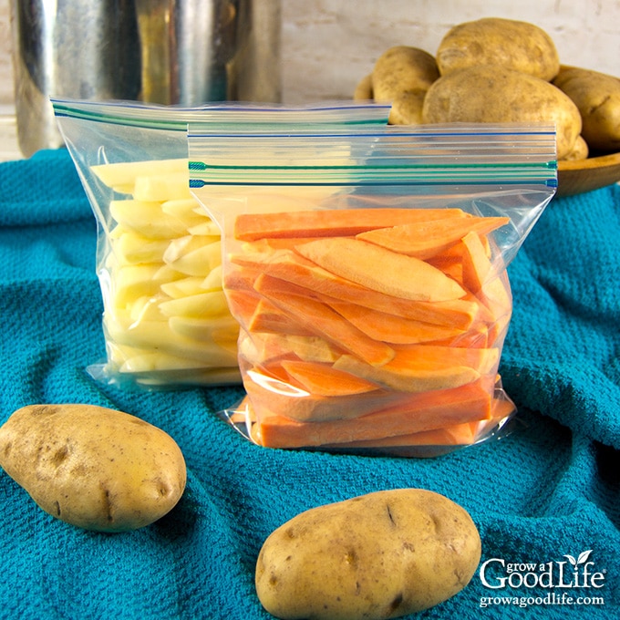 frozen French fries and sweet potato fries in a freezer bag