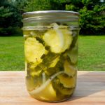 Pickle that big harvest of zucchini from your vegetable garden with this easy sweet and sour zucchini pickles canning recipe.