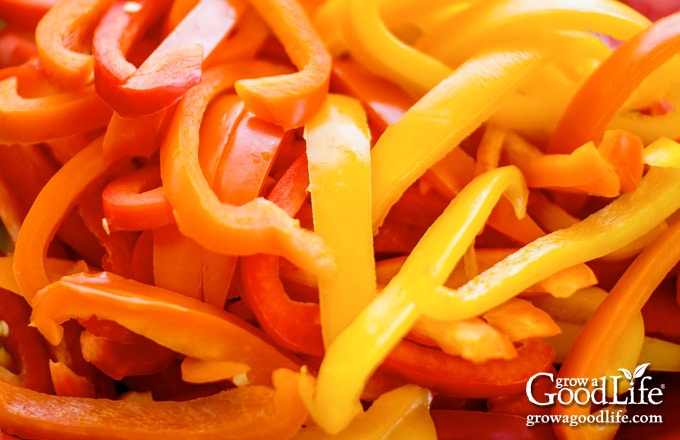 pile of yellow and red peppers cut into strips