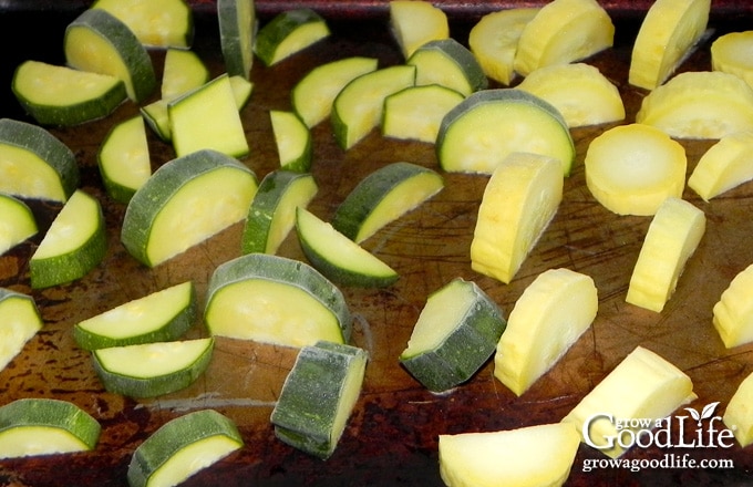 Zucchini slices on a baking sheet