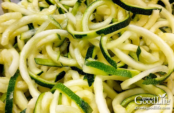 close up of a pile of zucchini noodles