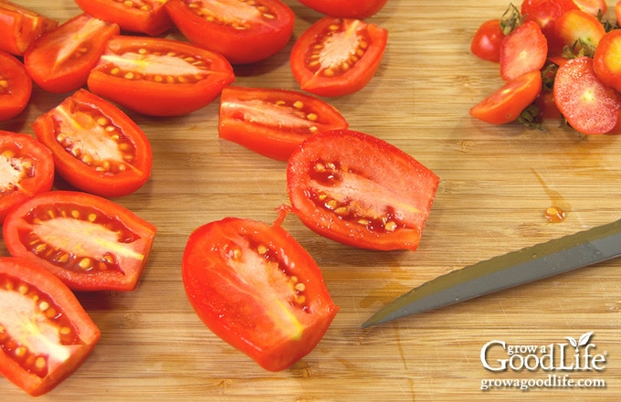 tomatoes on cutting boaard