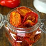 No sunshine required to make these homemade sun dried tomatoes. Drying tomatoes is a great way to preserve the harvest and save storage space. 20 pounds of tomatoes will reduce down to about one pound of sun dried tomatoes.
