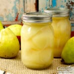 jars of home canned pears on a table