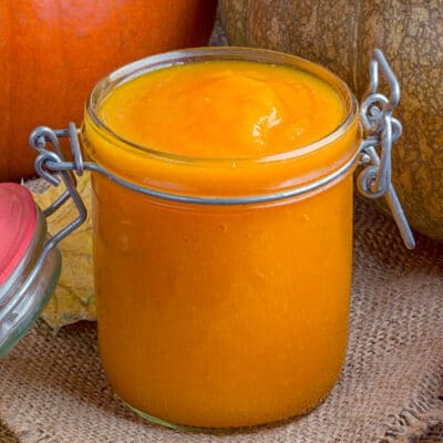 glass jar filled with homemade pumpkin puree
