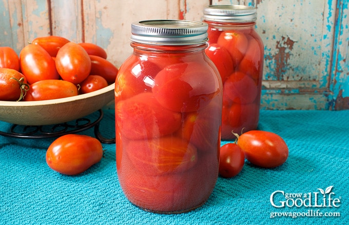 home canned whole tomatoes in two quart sized jars