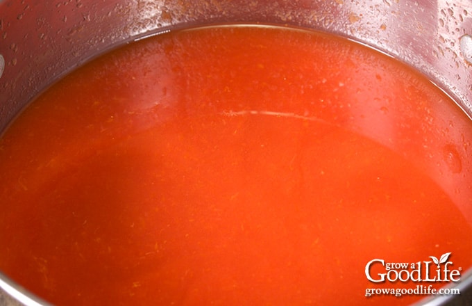 tomato puree in a pot before cooking