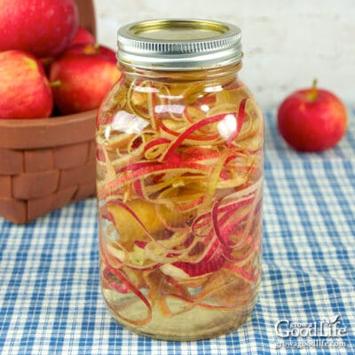 jar of apple peelings and cores ready to ferment