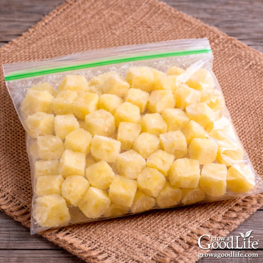 A freezer bag filled with frozen cubed potatoes.