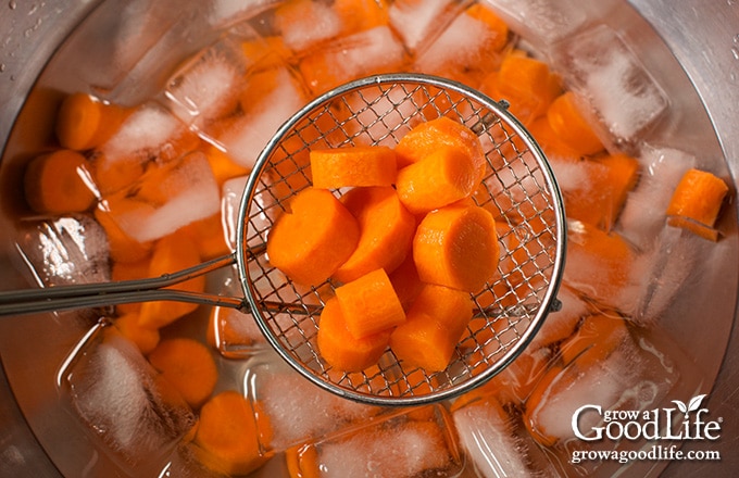 blanched carrots in ice water