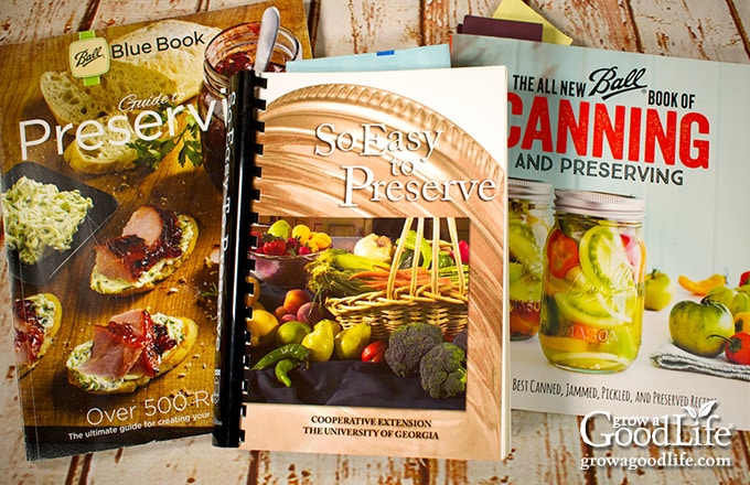 a collection of canning books