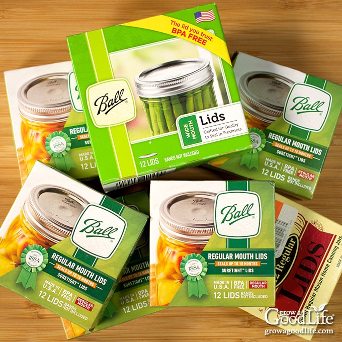 packages of different sized canning lids for mason jars.