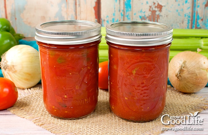Two jars of home canned stewed tomatoes.