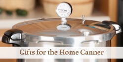 Close up image of a dial gage pressure canner with text overlay that reads gifts of the home canner.