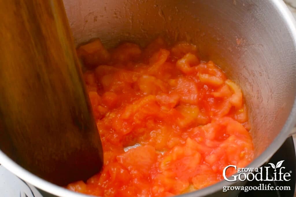 Crushed tomatoes in a pot.