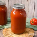 A jar of home canned tomato juice.