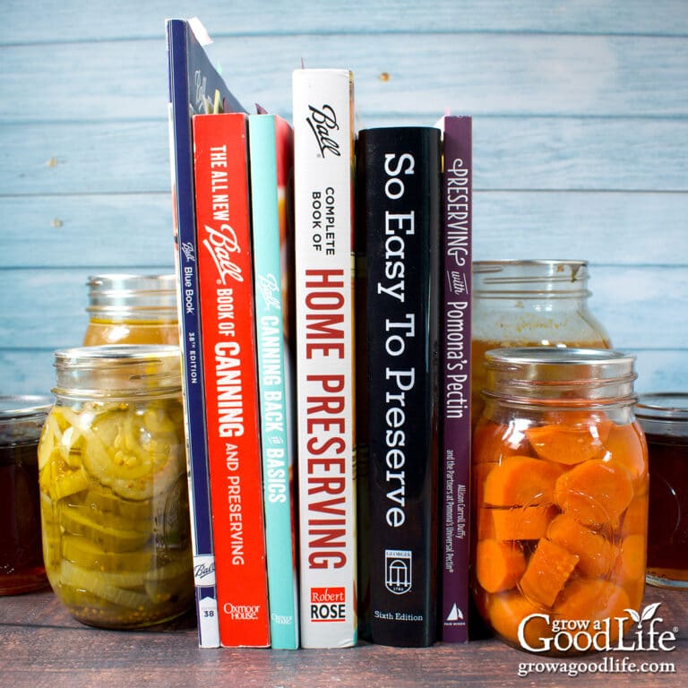 Upright canning books with jars.
