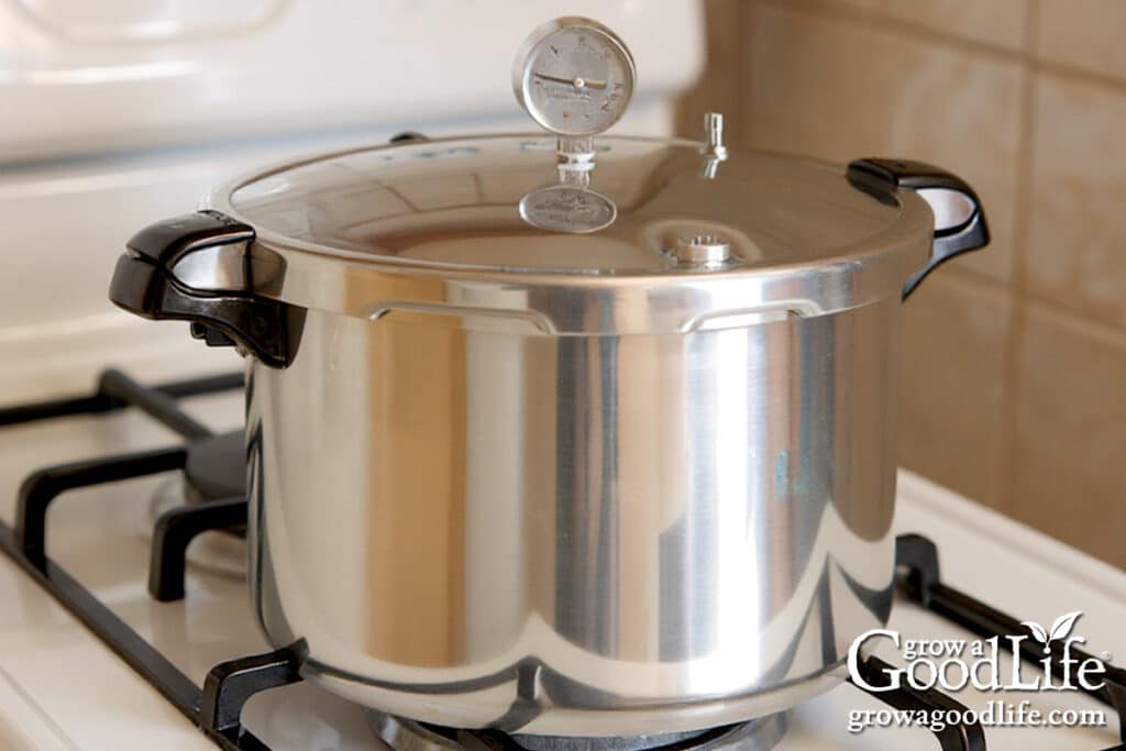 A pressure canner on a stove.